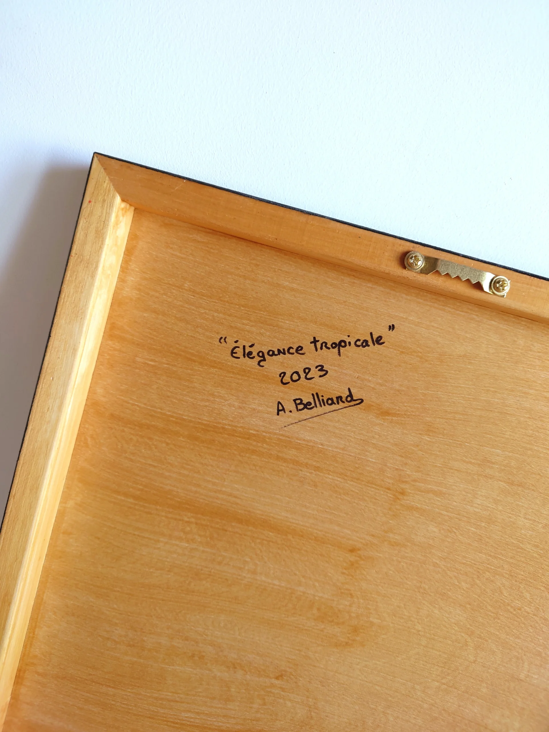 Petit tableau de fleurs tropicales d'orchidée roses avec son feuillage vert de taille 30x30 cm