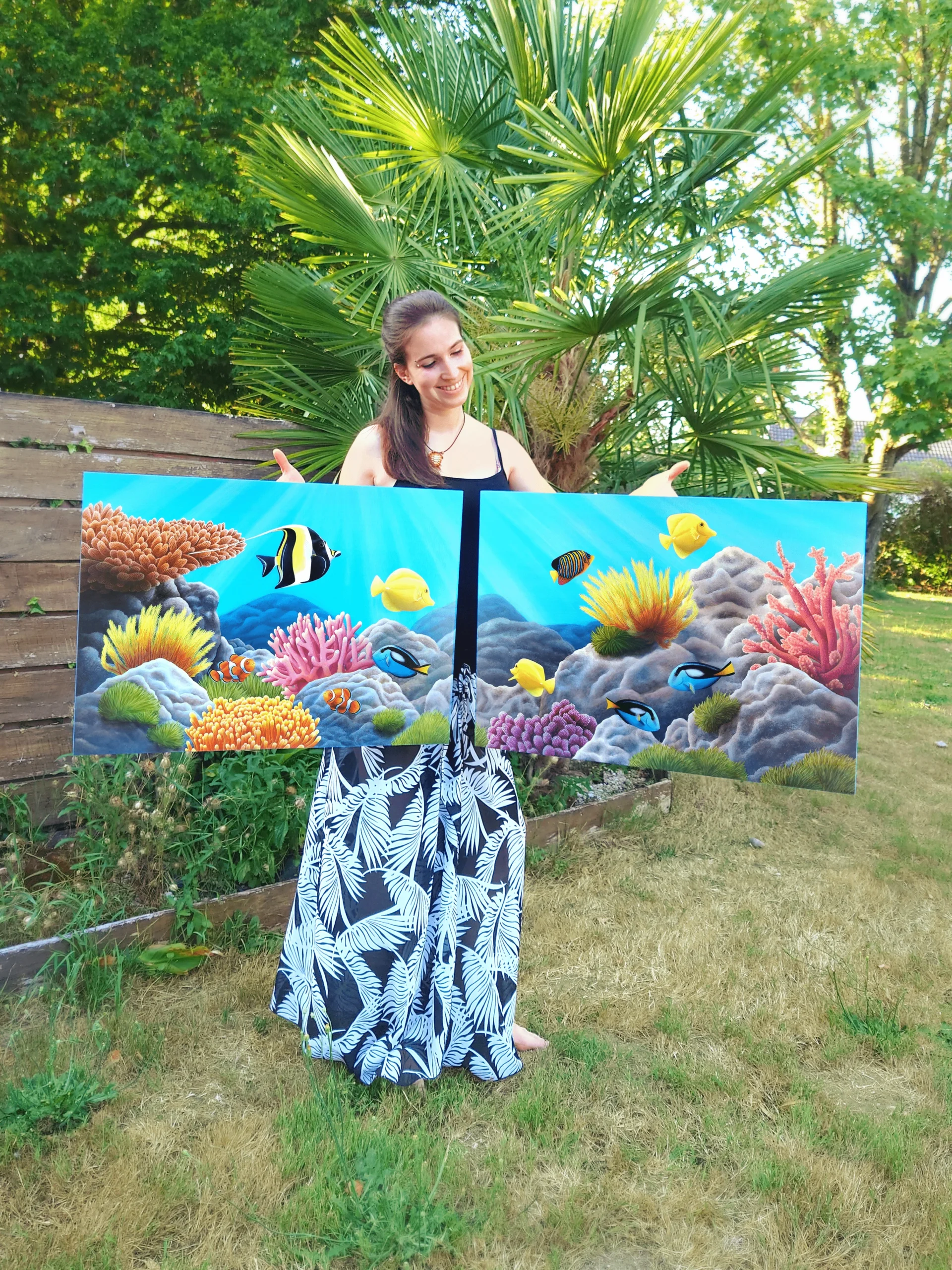 Grand tableau d'art mural tropical et exotique de poissons tropicaux dans les récifs colorés d'un océan de lumière