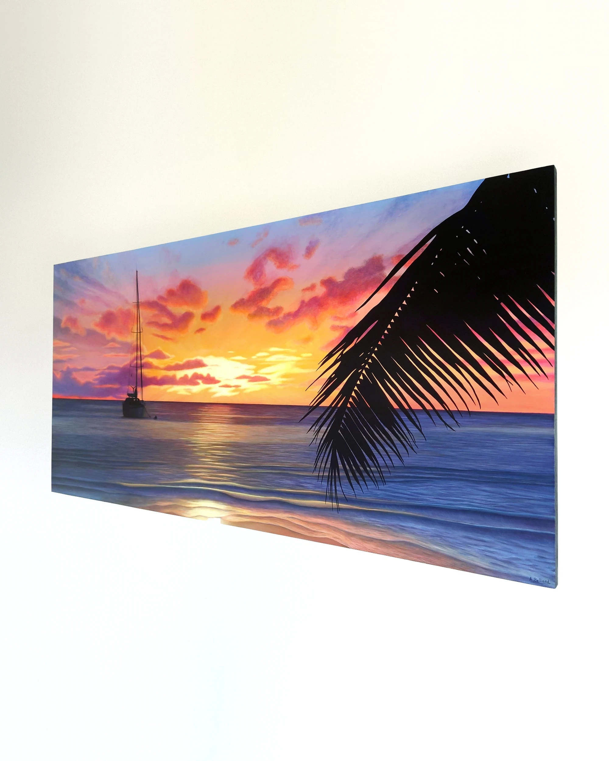 Peinture acrylique d'un coucher de soleil sur la mer de tahiti de taille 50x100 cm accroché sur un mur.